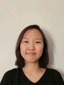 Headshot of Eunice Kim in front of white backdrop